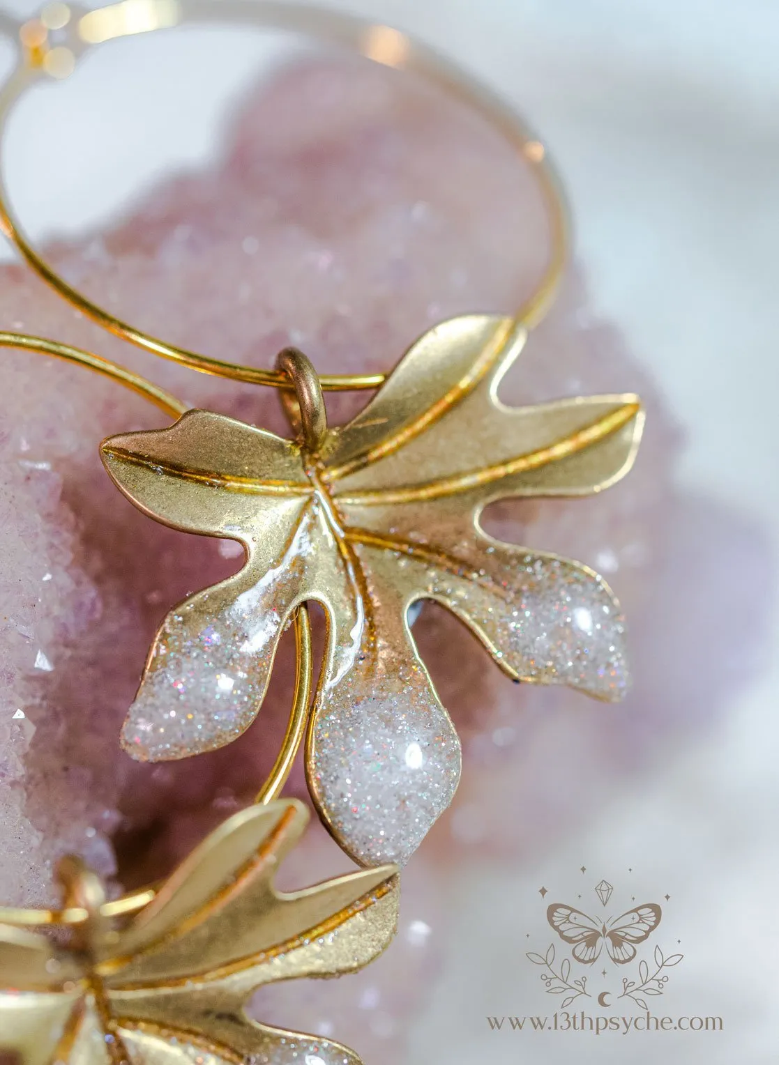 Hypoallergenic gold hoop earrings with frosted leaves