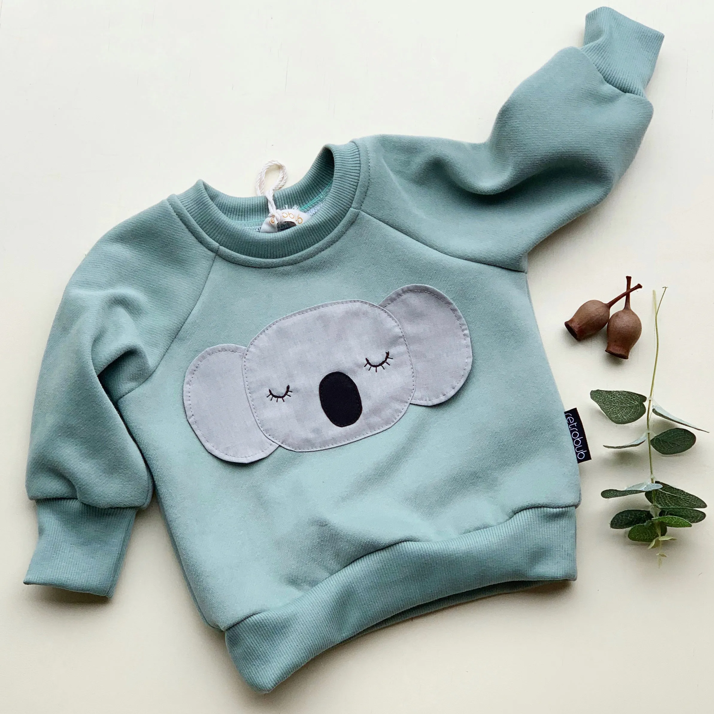 KOALA fleecy sweater - snow-gum green