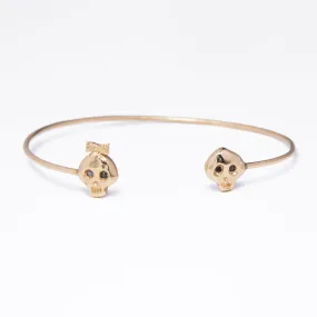 WD166 14kt gold girl and boy skull cuff